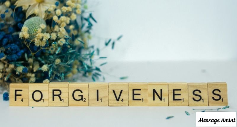Wooden letter tiles spelling out the word forgiveness with blue and yellow flowers, perfect for apology and forgiveness messages for a sister-in-law.