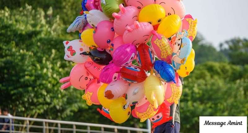 Colorful balloons representing different heart emoji colors and their meanings
