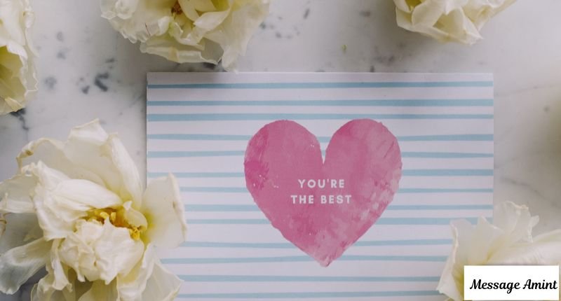 A blue striped greeting card with a pink heart that says you're the best surrounded by white flowers, perfect for heart touching bhabi messages that reflect love, respect, and tradition.