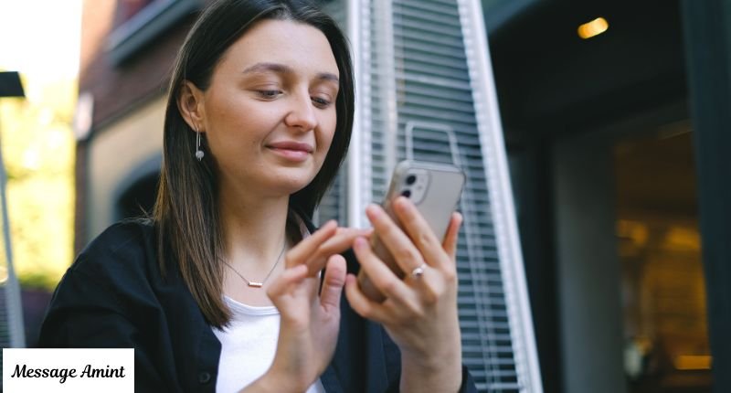 A woman typing on her smartphone, looking for overwhelmed and stressful responses to how's your day going.