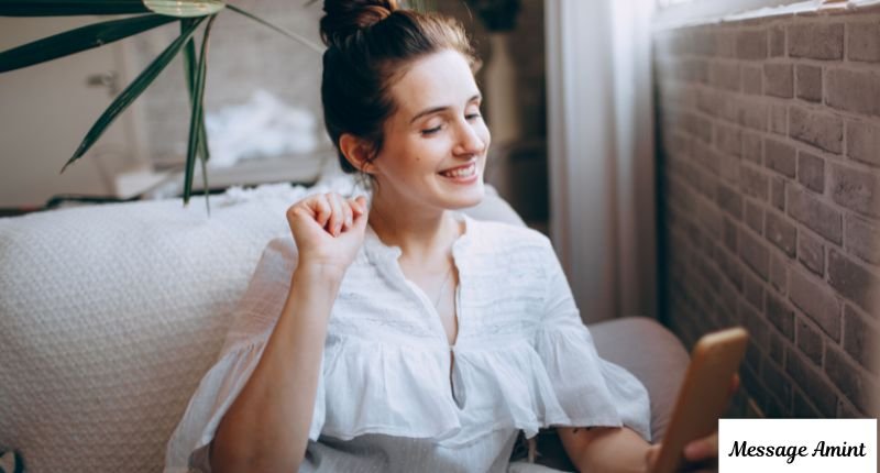 Aunt reading good morning message on phone smiling happily