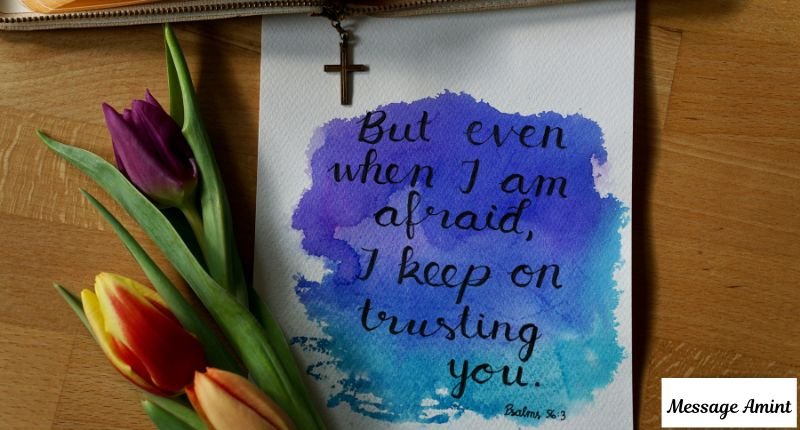 A beautiful watercolor greeting card with a sweet and heart touching message to make your sister-in-law feel special, placed next to purple and yellow tulip flowers.
